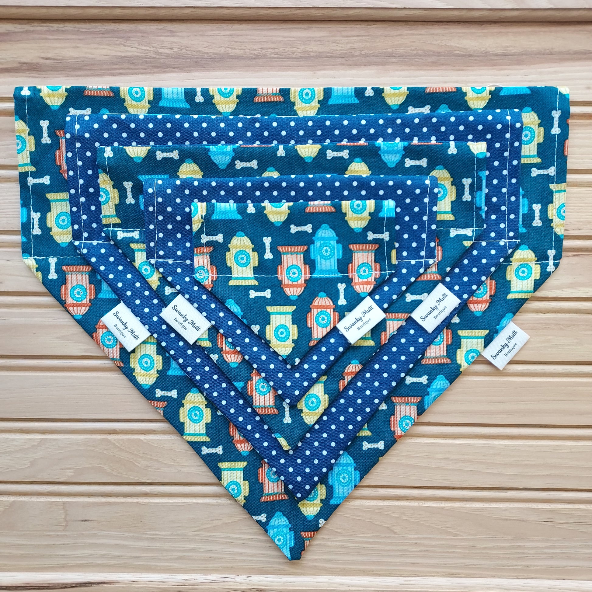 Reversible, slide over the collar dog bandana with fire hydrants and Dots.